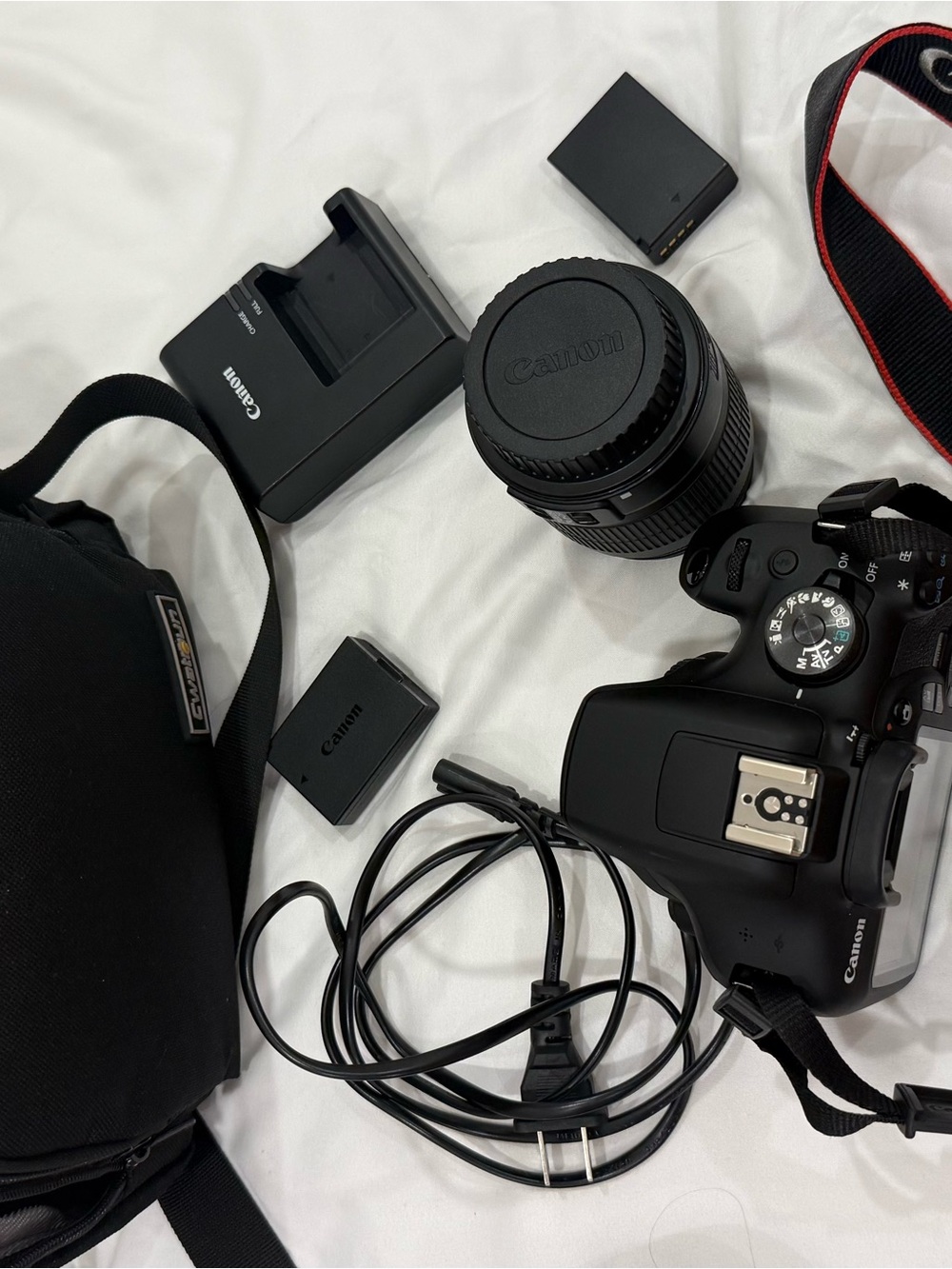 Canon Eos Rebel t7
Comes with bag, 2 batteries and charger
